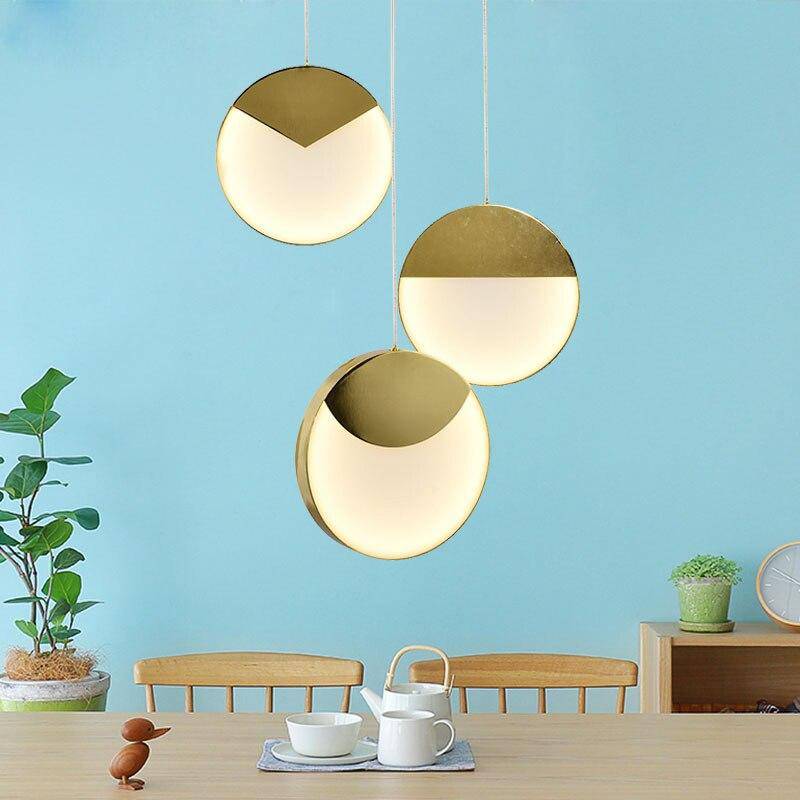 Lámpara de suspensión design LEDs con formas doradas redondeadas Creative