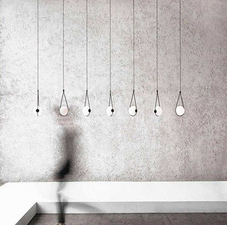 Suspension design boule accrochée Designer