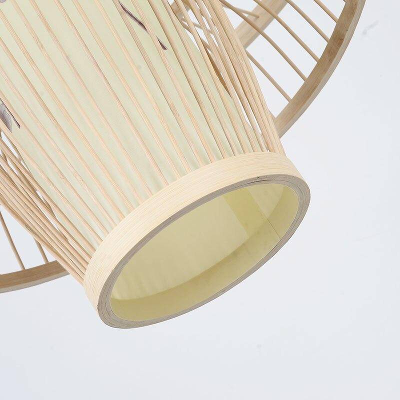 Lámpara de suspensión design en una jaula de bambú Granja