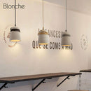 Suspension design à LED avec abat-jour en ciment et corde rustique