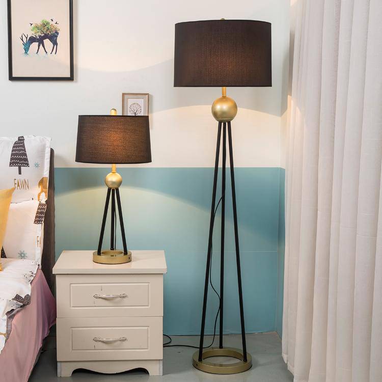 LED bedside lamp with three linked feet, gold ball and lampshade fabric