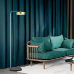 Lampadaire design doré arrondi Study