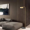 Lampadaire design doré arrondi Study