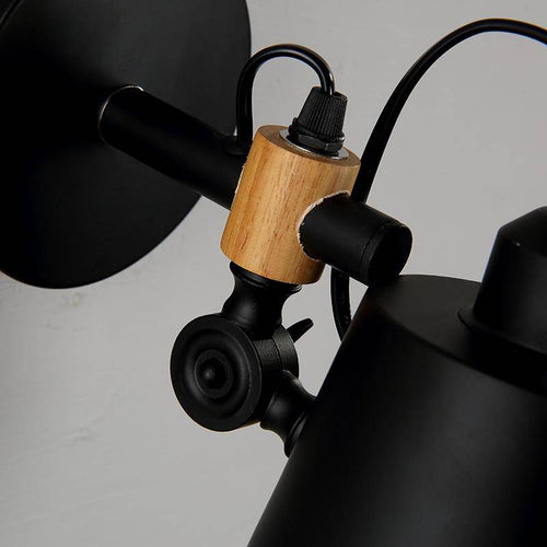 Lámpara de pared design en madera y metal negro Sentado