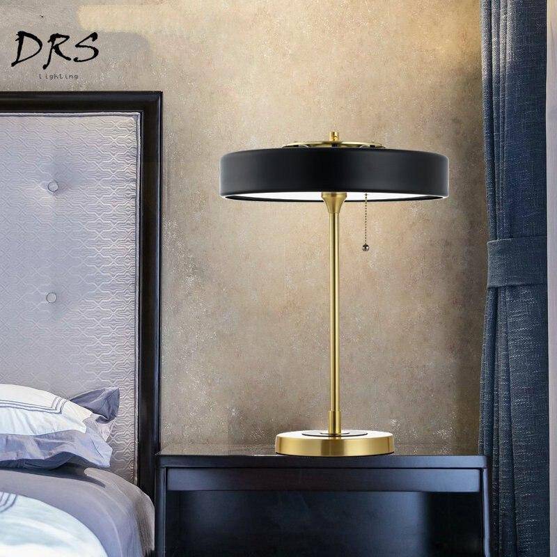 Bedside lamp gold and lampshade black metal cylindrical Mesa