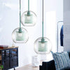 Suspension design à LED cage dans boule en verre