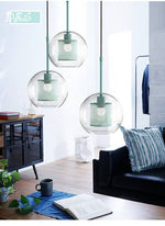 Suspension design à LED cage dans boule en verre