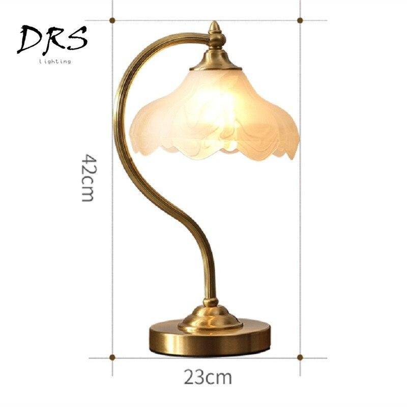 Gold table lamp with lampshade in glass Copper