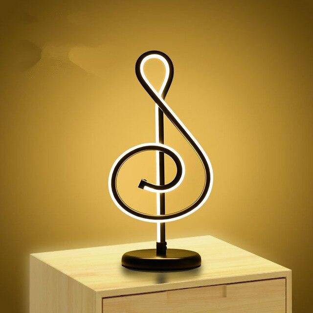 LED table lamp in the shape of a treble clef