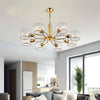 Lustre design moderne doré avec boules de verre Glass