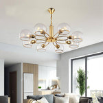 Lustre design moderne doré avec boules de verre Glass