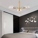 Lustre design moderne doré avec boules de verre Glass