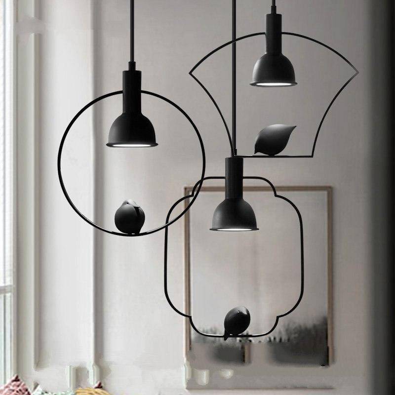 pendant light metal form with hanging bird