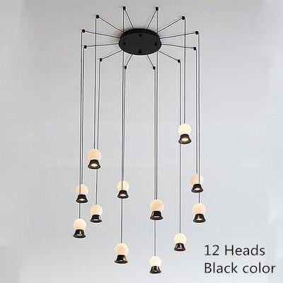 Suspension et lustre design à LED avec boule en verre et support dorée