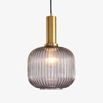 Suspension design en verre coloré et base dorée