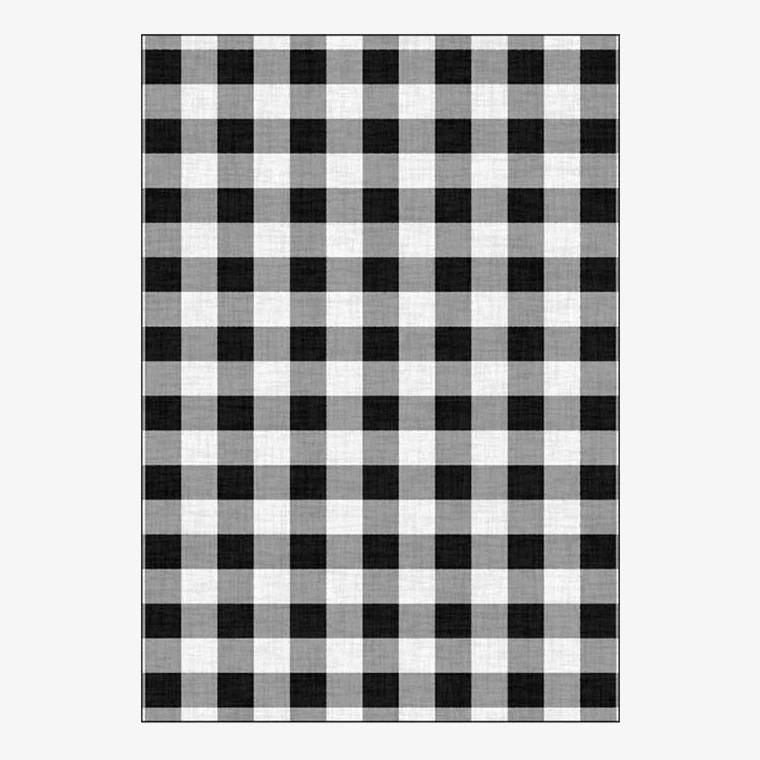 Rectangular carpet with black and white grid pattern