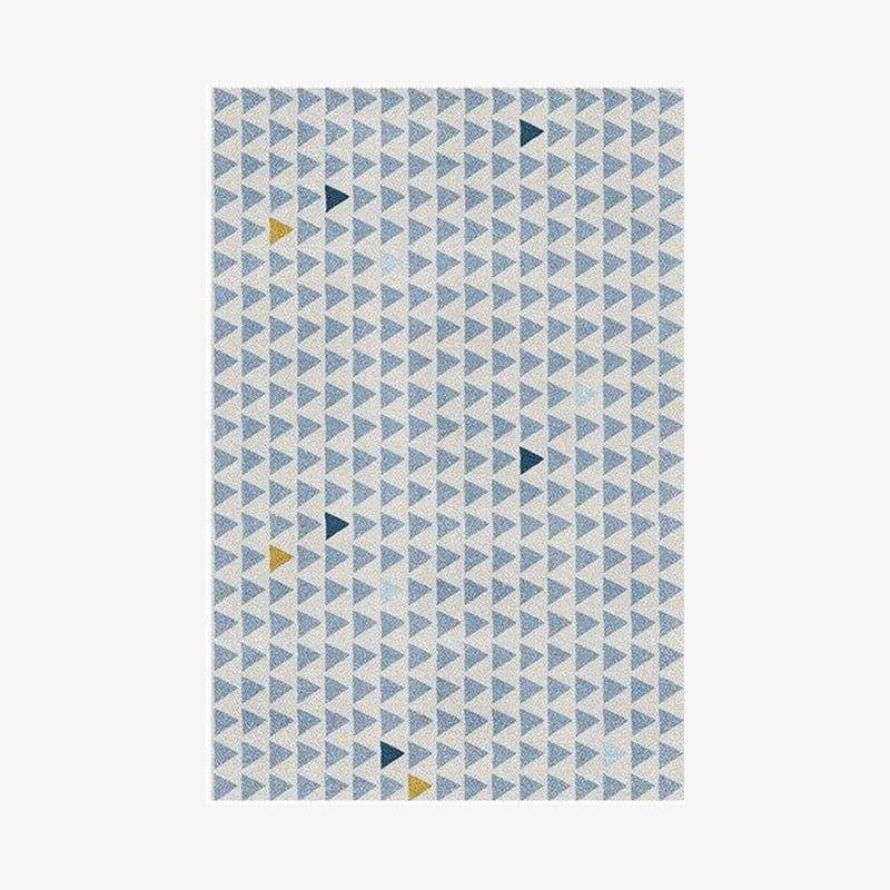 Tapis rectangle aux motifs géométriques bleus